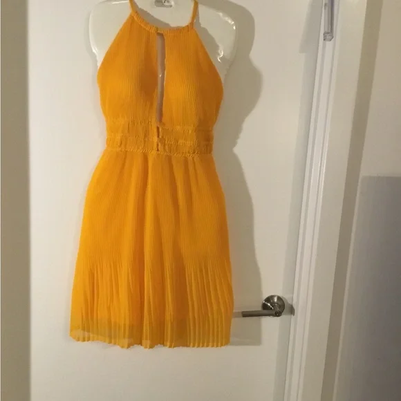 h&m yellow pleated dress Dress Decode | This yellow draped h&m dress feels made for @laraib_rahim's  vacation wardrobe  . . . . . . . . . . . . . #laraibrahim #vacation #hm...